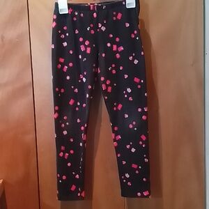 Girl's leggings from Children's Place, printed pattern of rubies on black- 10/12